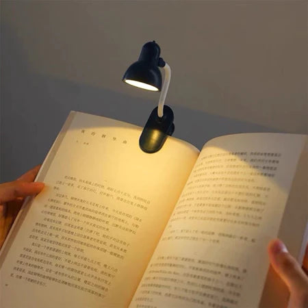 Luminária LED portátil ajustável com clip para leitura e mesa